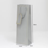 كيس هدايا طويل بإطار ذهبي