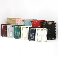 أكياس هدايا مزخرفة بإطار ذهبي