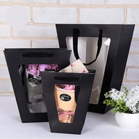 اكياس ورقية بنافذة شفافة وبعدة الوان 26*11سم