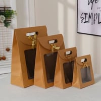 اكياس ورقية بنافذة شفافة و فيونكة