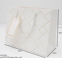 اكياس ورقية محفورة 23*10*18 بعدة الوان