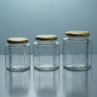 برطمان عسل زجاج سداسي