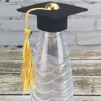 قبعات تخرج صغيرة للتوزيعات