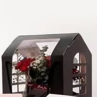 علب هدايا ورقية بشكل منزل