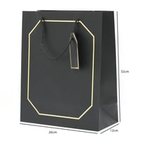 أكياس هدايا بإطار ذهبي