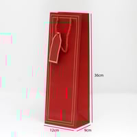 كيس هدايا طويل بإطار ذهبي