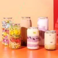 علب حلويات ومشروبات بغطاء معدني كبس