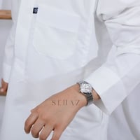 ساعة أطفال فضي مينا ابيض متوفر من ٤ سنوات الى ١٤ س...