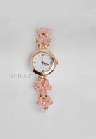 ساعه بنات وردات ذهبي و وردي من عمر شهر الى 14 سنه