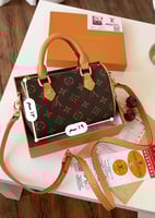 شنطة لويس فيتون صغيرة بني