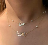 سلسالك بعنقي بمثابة الآمان .