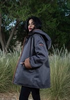 جاكيت نسائي شتوي قصير مع أطراف جلدية