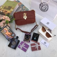 شنطة فرزاتشي مع مجموعة إكسسوارات أنيقة