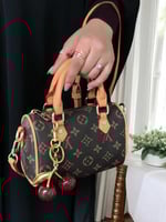 شنطة لويس فيتون صغيرة بني