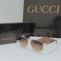 نظارات قوتشي رجالي | تصميم طيار كلاسيكي مع شعار ال...