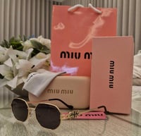 ميو ميو نظارات نسائية | درجة أولى وملحقات كاملة