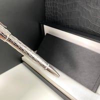 قلم دنهل سنتري مان طبق الأصل