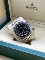 رولكس سمبارينر ذهبي على أسود هاي كواليتي