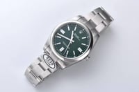 رولكس أويستر بربتشوال أخضر | ماستر كواليتي