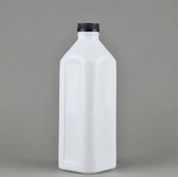 عبوة مستطيل أبيض 1.5 لتر