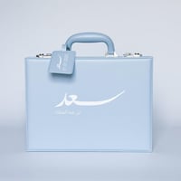 حقيبة جلدية فاخرة- بلباس من Ted Baker