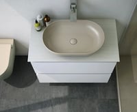 حوض مغسلة بيضوي لون بيج فوق الرخام مع رأس هراب -را...