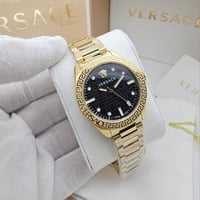 ساعة فرزاتشي ذهبي اسود