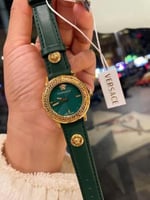 ساعة فرزاتشي جلد اخضر بذهبي