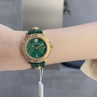 ساعة فرزاتشي جلد اخضر بذهبي