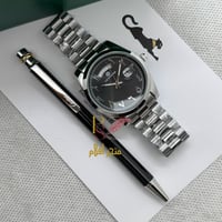 ساعة شبيهة رولكس مع قلم كارتير