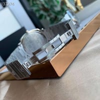 ساعة قوتشي طبلون