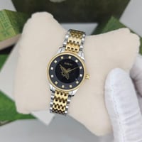 ساعة قوتشي النحلة