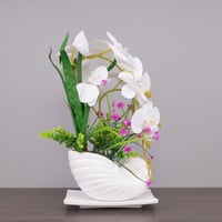 حوض و اصيص ازهار ابيض مزين بورود الاوركيد البيضاء...