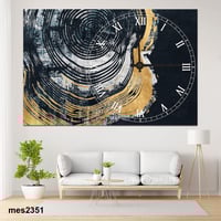 ساعة حائط أكريليك مستطيلة – تصميم أسود وذهبي فاخر