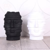 مجسم وجه مقسم بخطوط طولية - متعدد الألوان