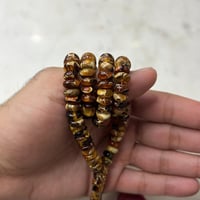 مسباح كهرمان بني