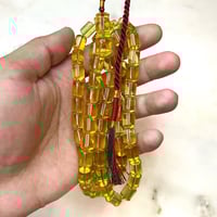 مسباح كهرمان شفاف