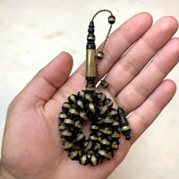 مسباح خشب الابانوس مجدول نحاس