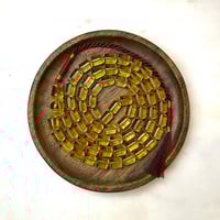 مسباح كهرمان شفاف