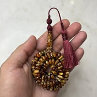 مسباح كهرمان بني