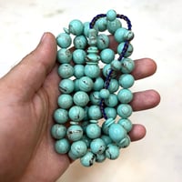 مسباح فاتوران فيروزي عقود