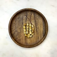 مسباح كهرمان فل شوائب