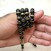 مسباح خشب الابانوس مجدول نحاس