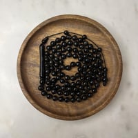 مسباح يسر اسود