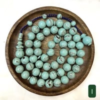 مسباح فاتوران فيروزي عقود