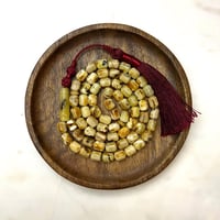 مسباح كهرمان فل شوائب