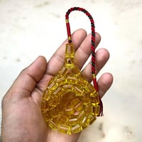 مسباح كهرمان شفاف