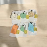 تعليقة سيارة مع زيت عطري