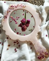 مرآة يدوية من الريزن