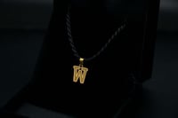 حرف ذهب W عيار 21 (P2315)